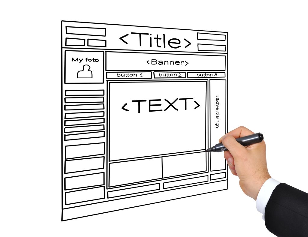 Hand sketching a website page layout